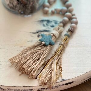 Hand beaded decorative garland with tassels
